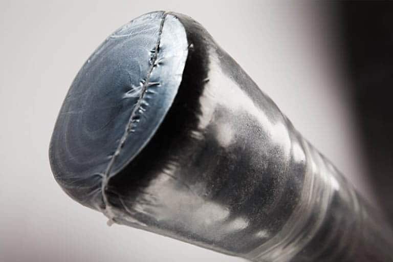 Close-up of a metal rod's end.