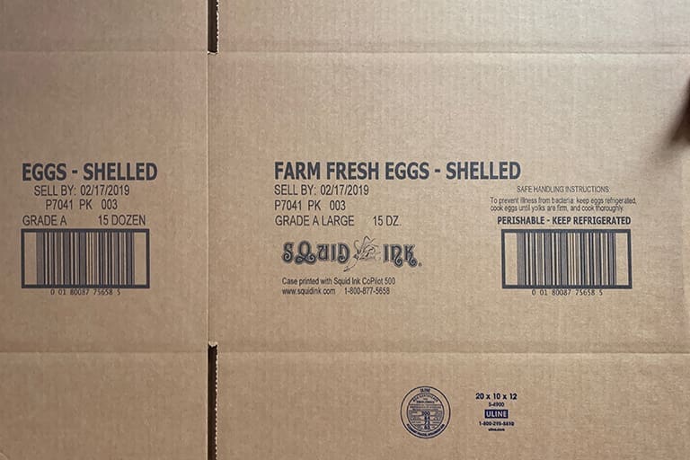Cardboard box labeled "Farm Fresh Eggs - Shelled.