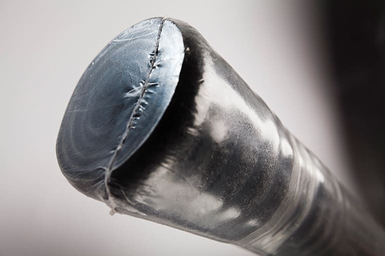 Close-up of a black baseball bat barrel.