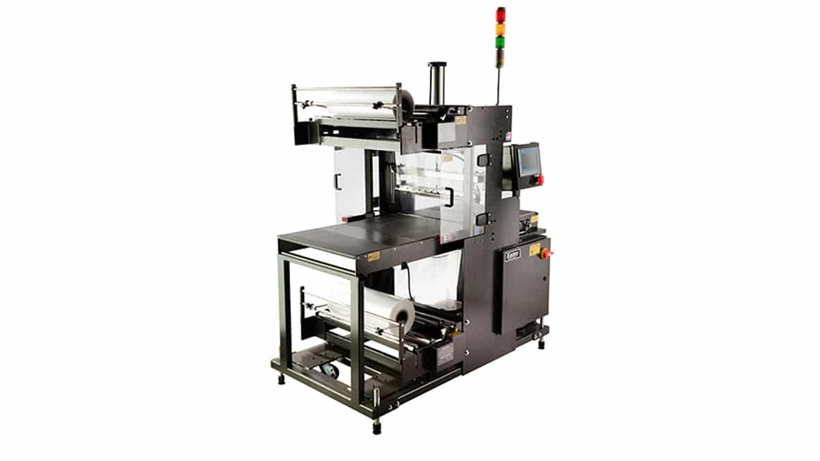Industrial packaging machine with control panel.