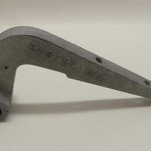 Metal bracket with holes and engraved text.