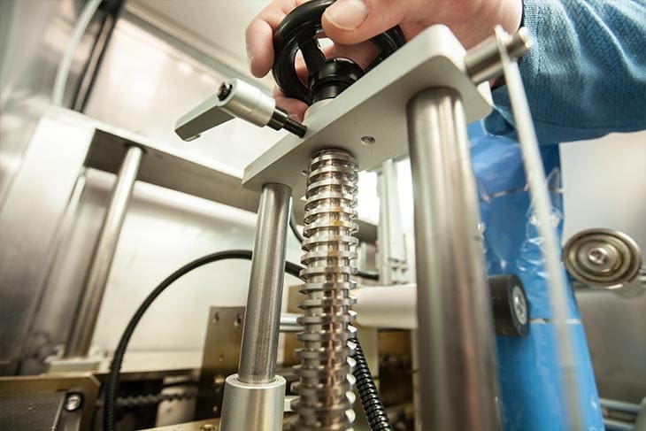 Technician working on an Eastey packaging machine