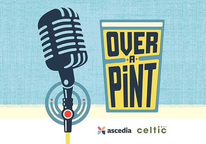 Retro microphone and "Over a Pint" logo.